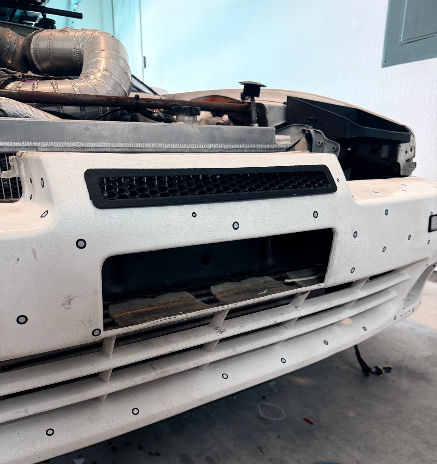 A70 Toyota Supra Front License plate Air Duct (89 - 92)